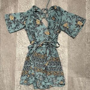 Women’s floral wrap romper with tie front